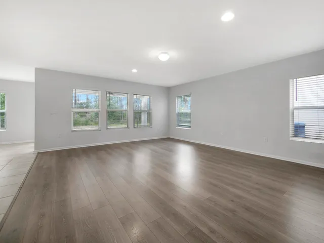 a large kitchen with cabinets