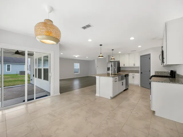 a view of kitchen and a sink