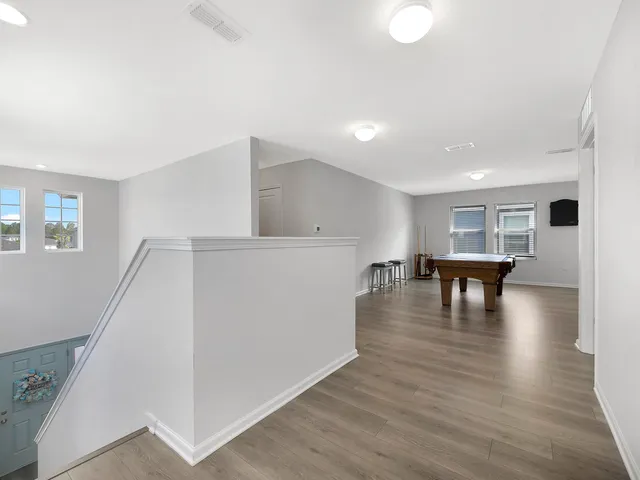 a bathroom with a sink double vanity and a toilet