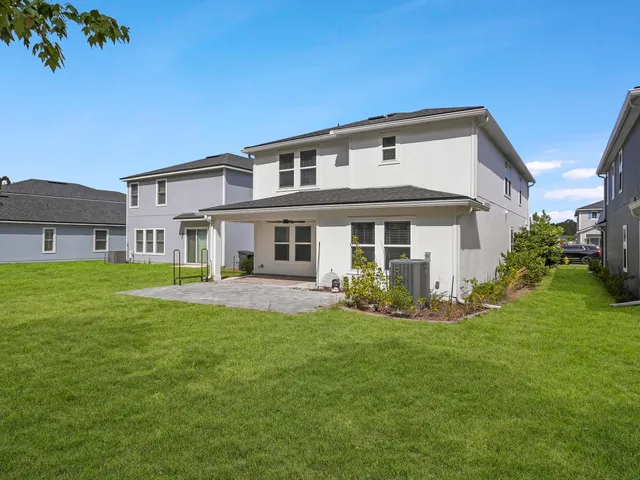 an aerial view of residential building with outdoor space