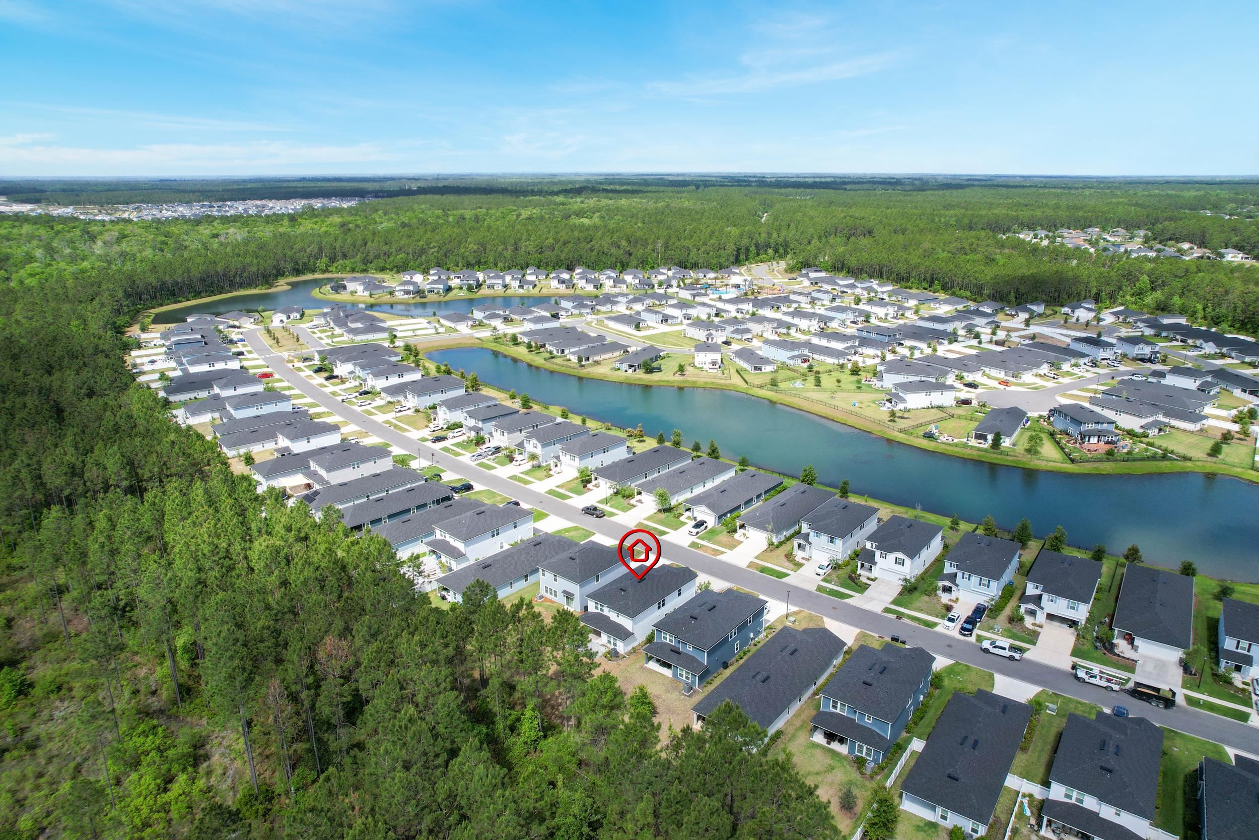 597 Meadow Ridge Drive St. Augustine, FL 32092 - Photo 52 of 56 a view of a city with an ocean