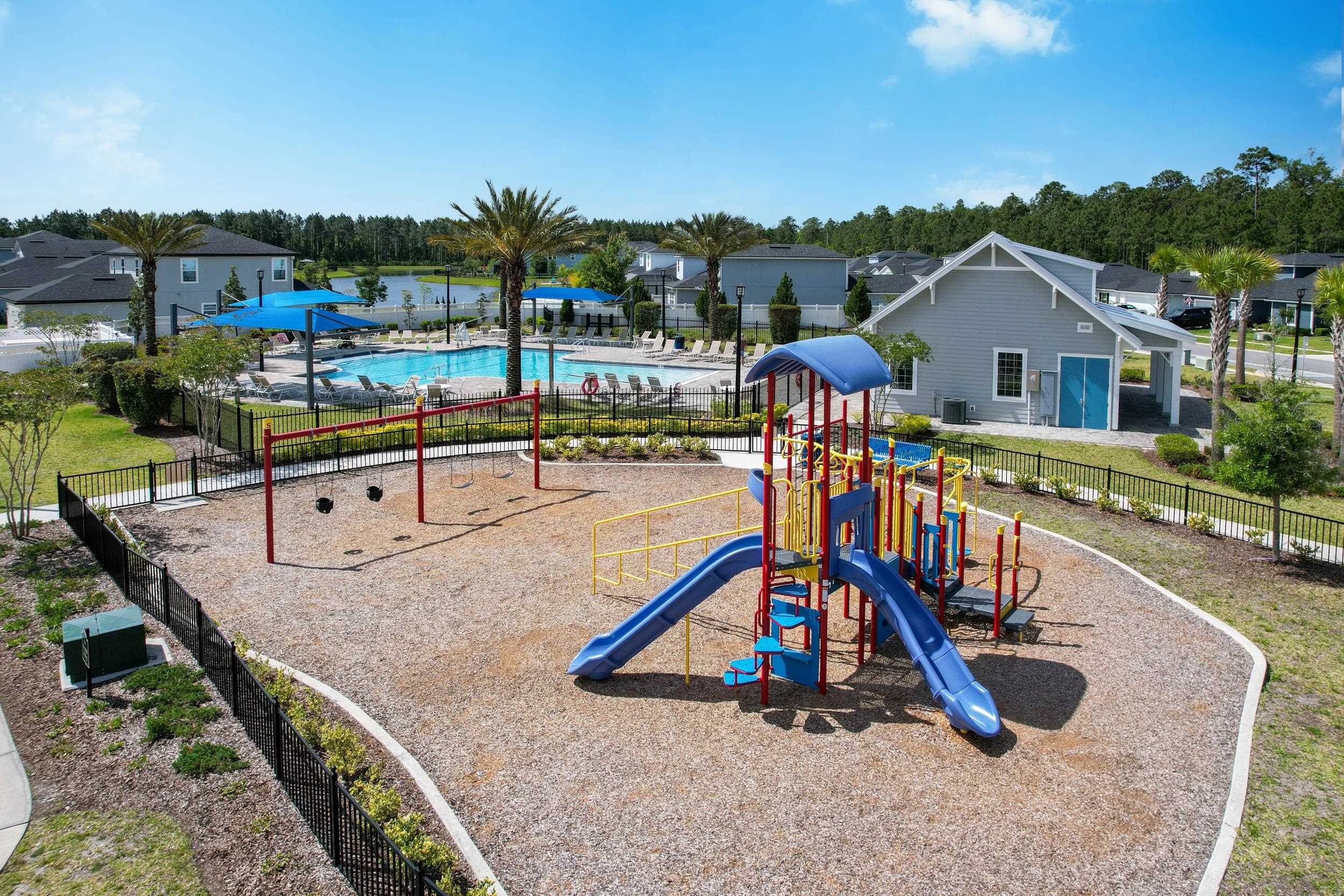 597 Meadow Ridge Drive St. Augustine, FL 32092 - Photo 55 of 56 a view of a house with swimming pool and sitting area