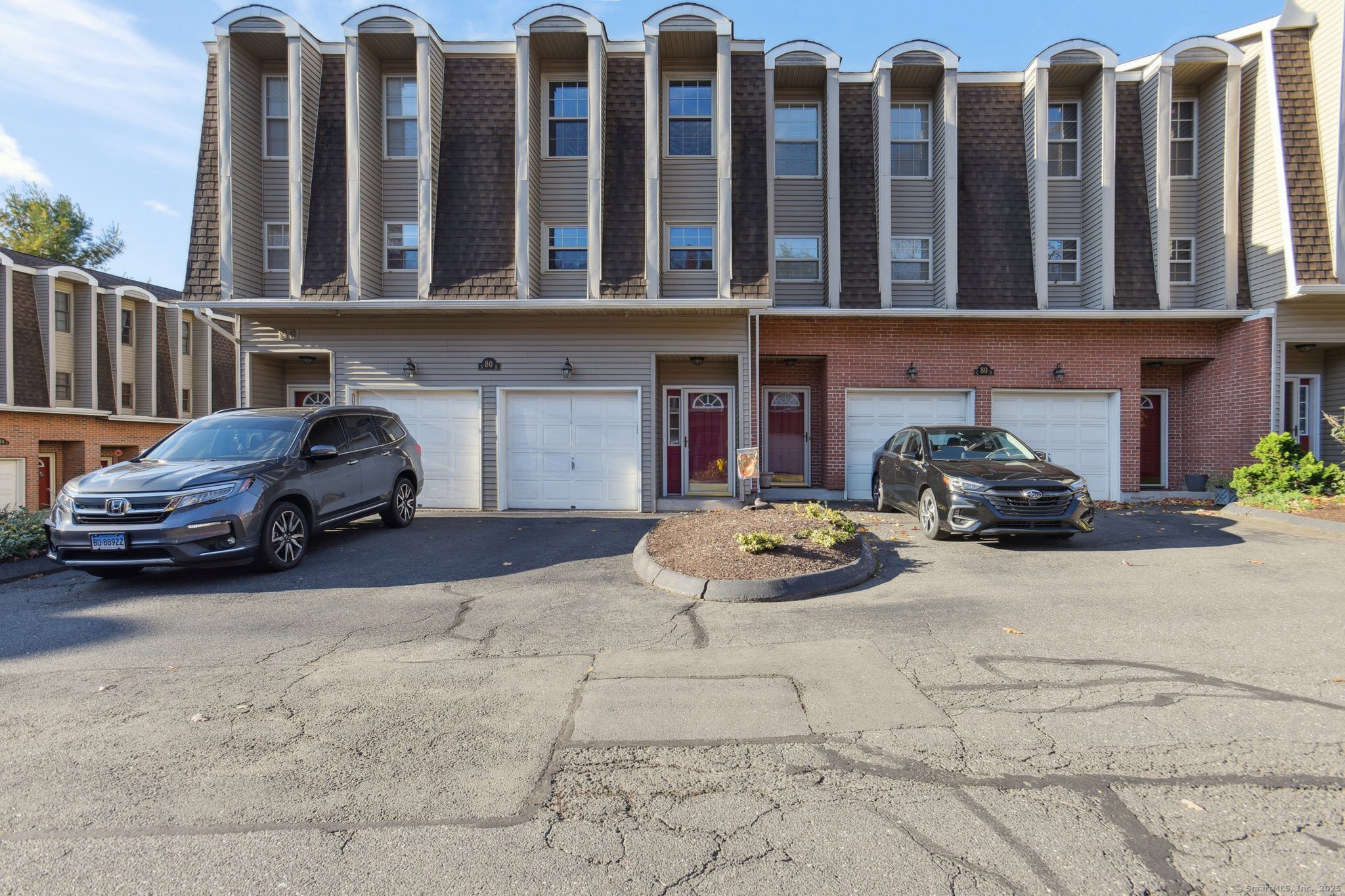 80 North Mountain Road, Unit B Berlin, CT 06037 - Photo 1 of 1 a car parked in front of a building