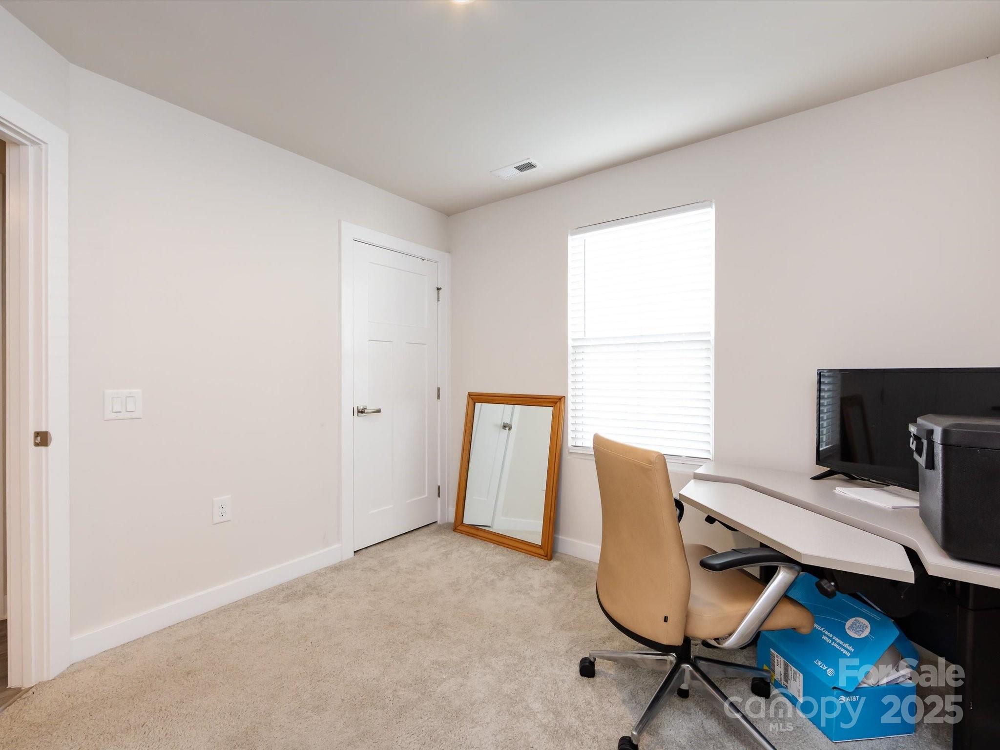 4231 Mackinnon Drive Charlotte, NC 28214 - Photo 29 of 35 a workspace with furniture and a window