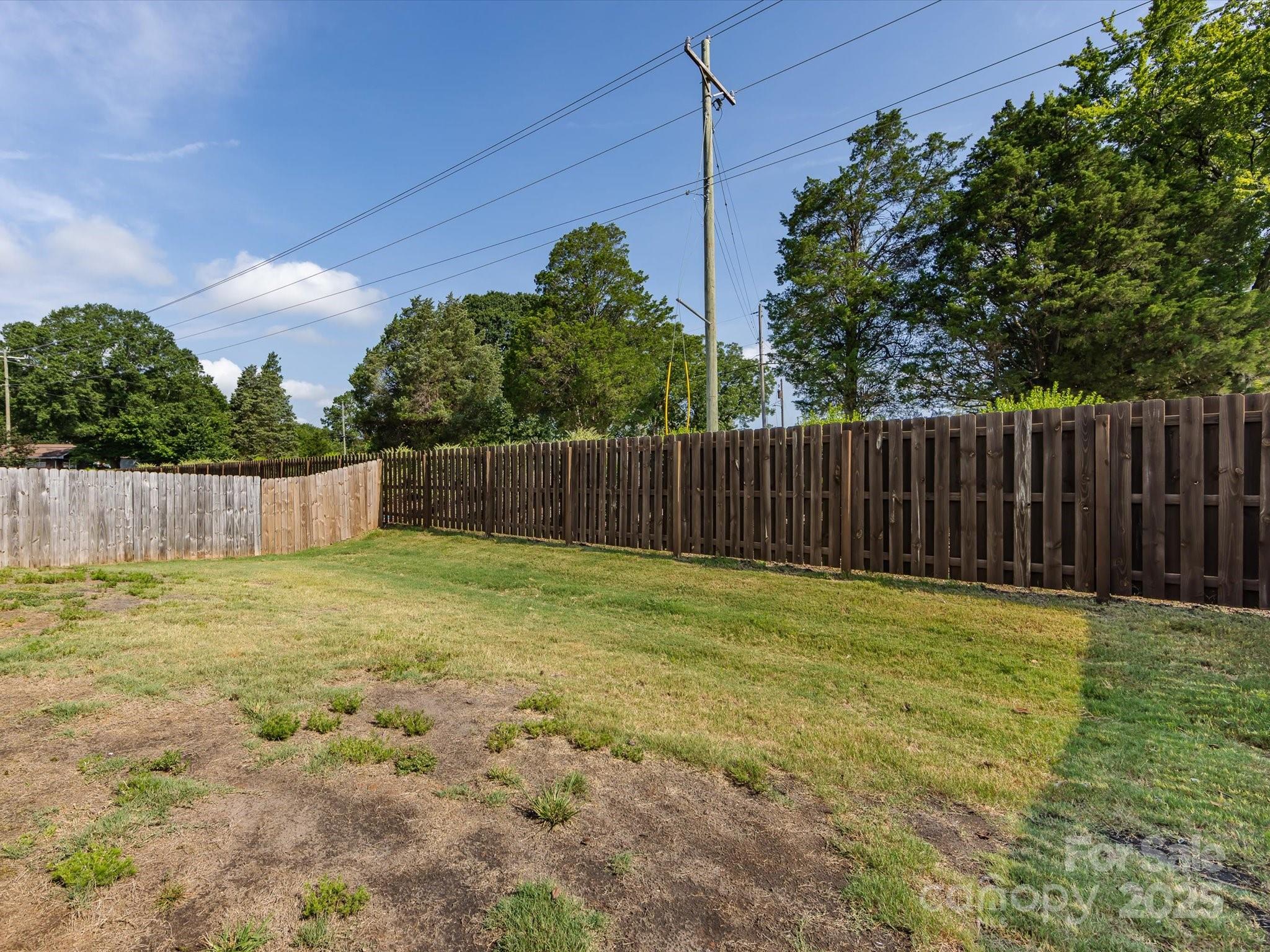 4231 Mackinnon Drive Charlotte, NC 28214 - Photo 35 of 35 a backyard of a house
