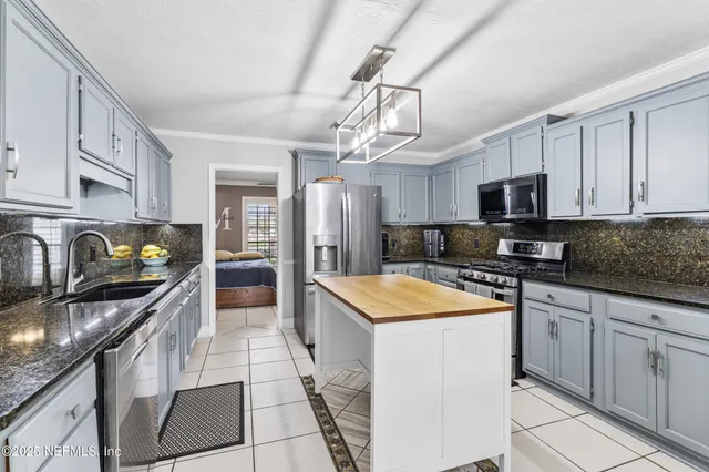 a view of a hallway with windows