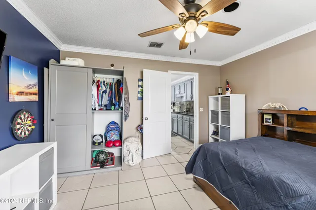a view of room with guitars and toys