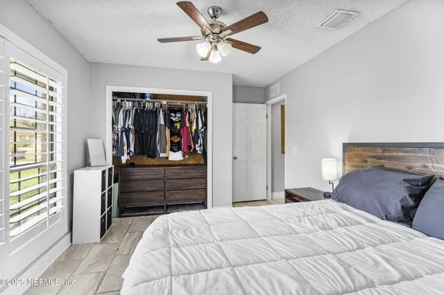 a swimming pool with outdoor seating