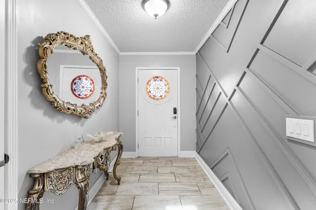 a view of livingroom with furniture and a fireplace