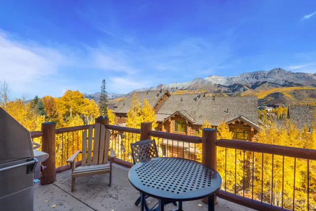 a view of a swimming pool with a lounge chair