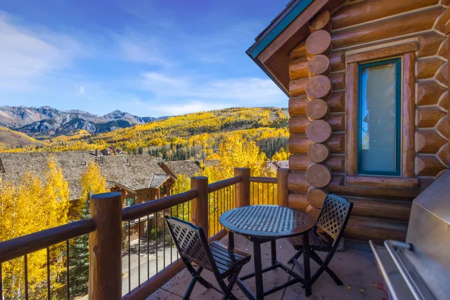 a view of a balcony dining area