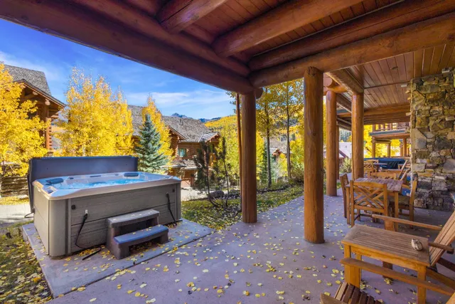 a view of a patio with wooden floor
