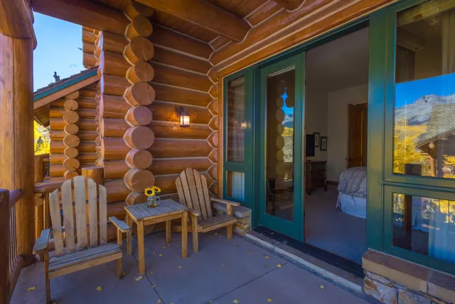 a view of a house with tub and chairs