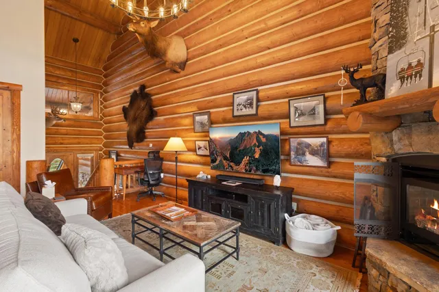a view of a chairs and a table in the balcony