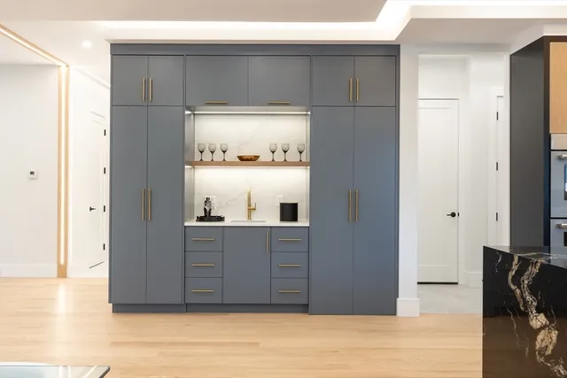 a view of kitchen with wooden floor