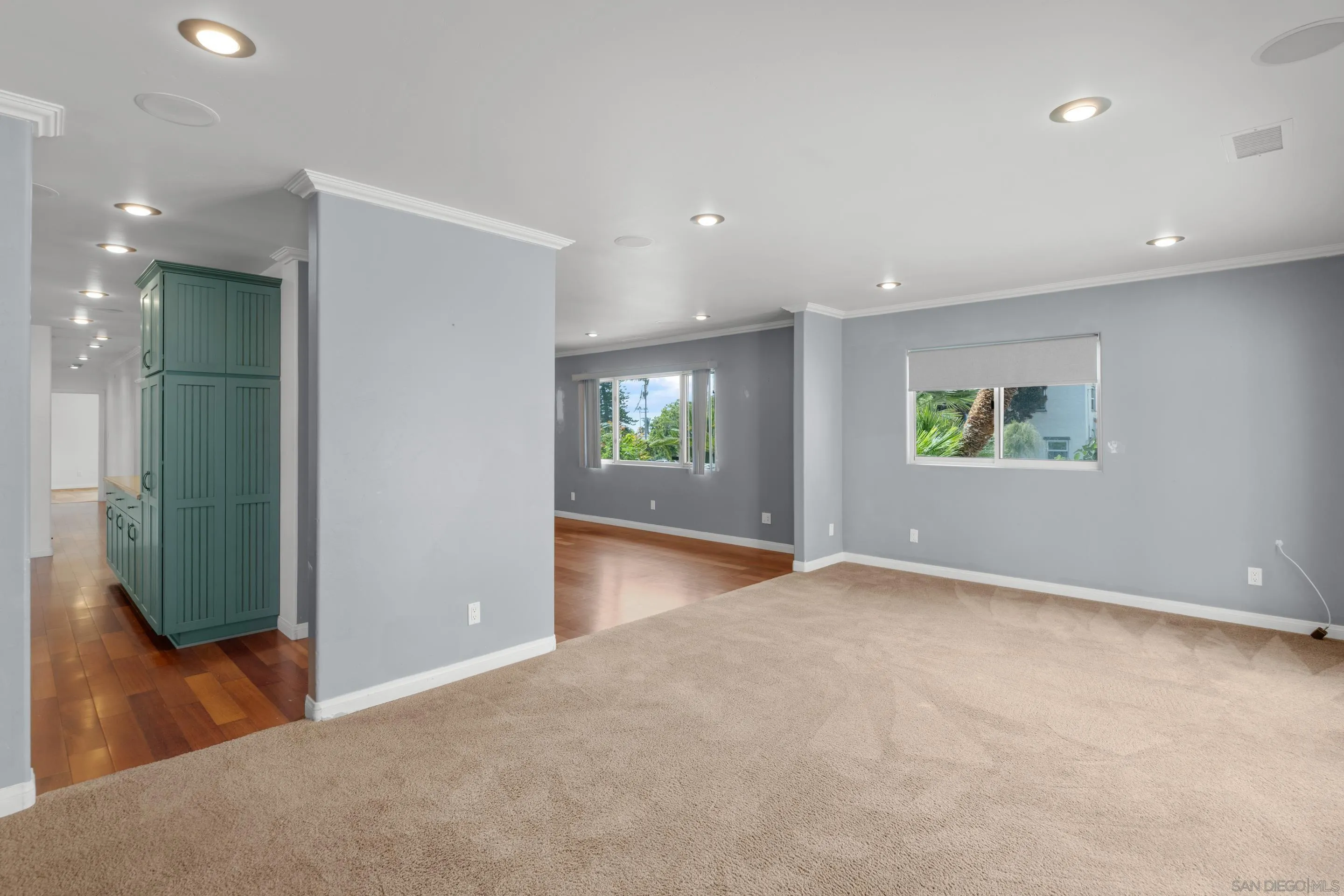 4975 Dawes Street San Diego, CA 92109 - Photo 14 of 39 an empty room with windows and entrance