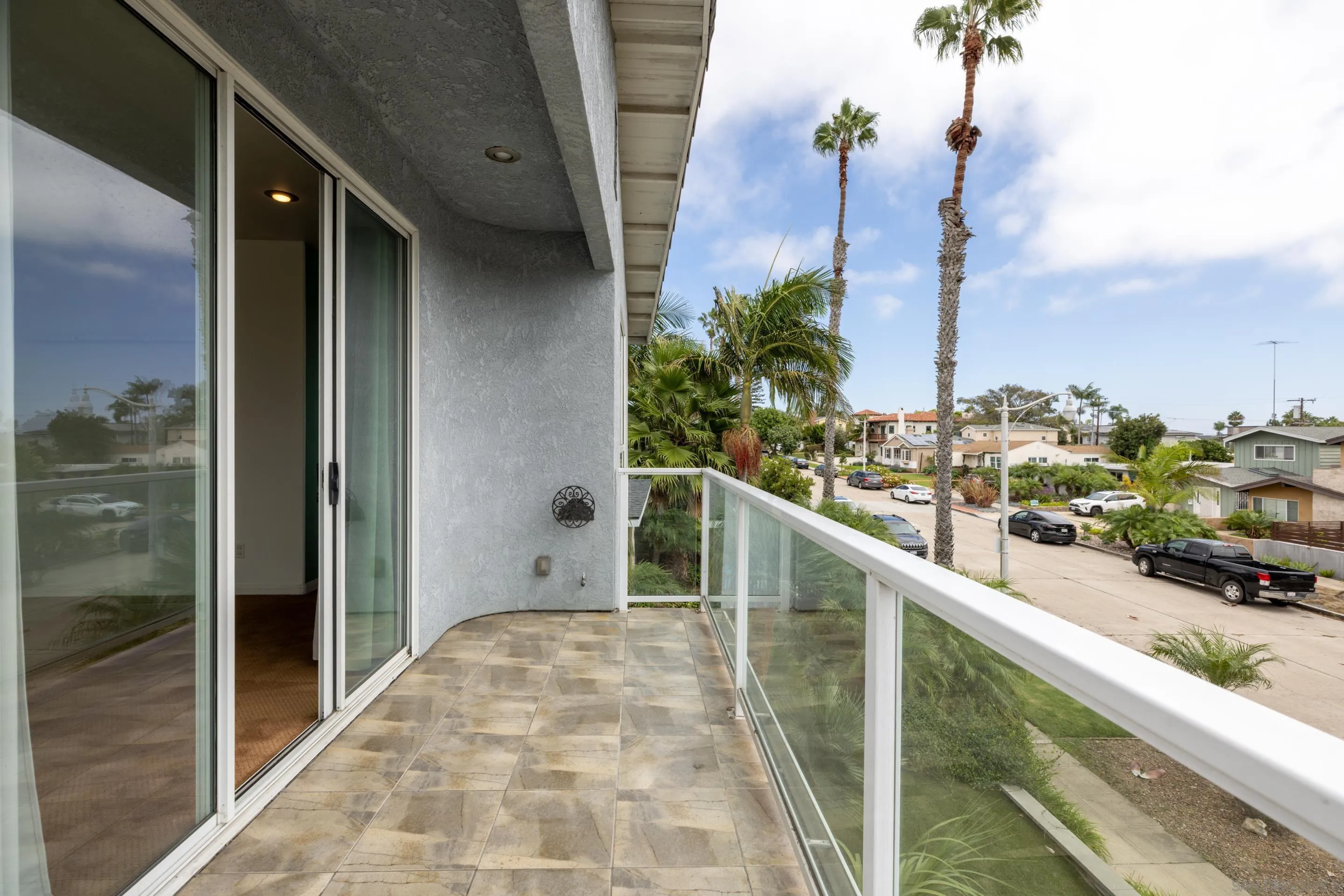 4975 Dawes Street San Diego, CA 92109 - Photo 19 of 39 a view of balcony with furniture