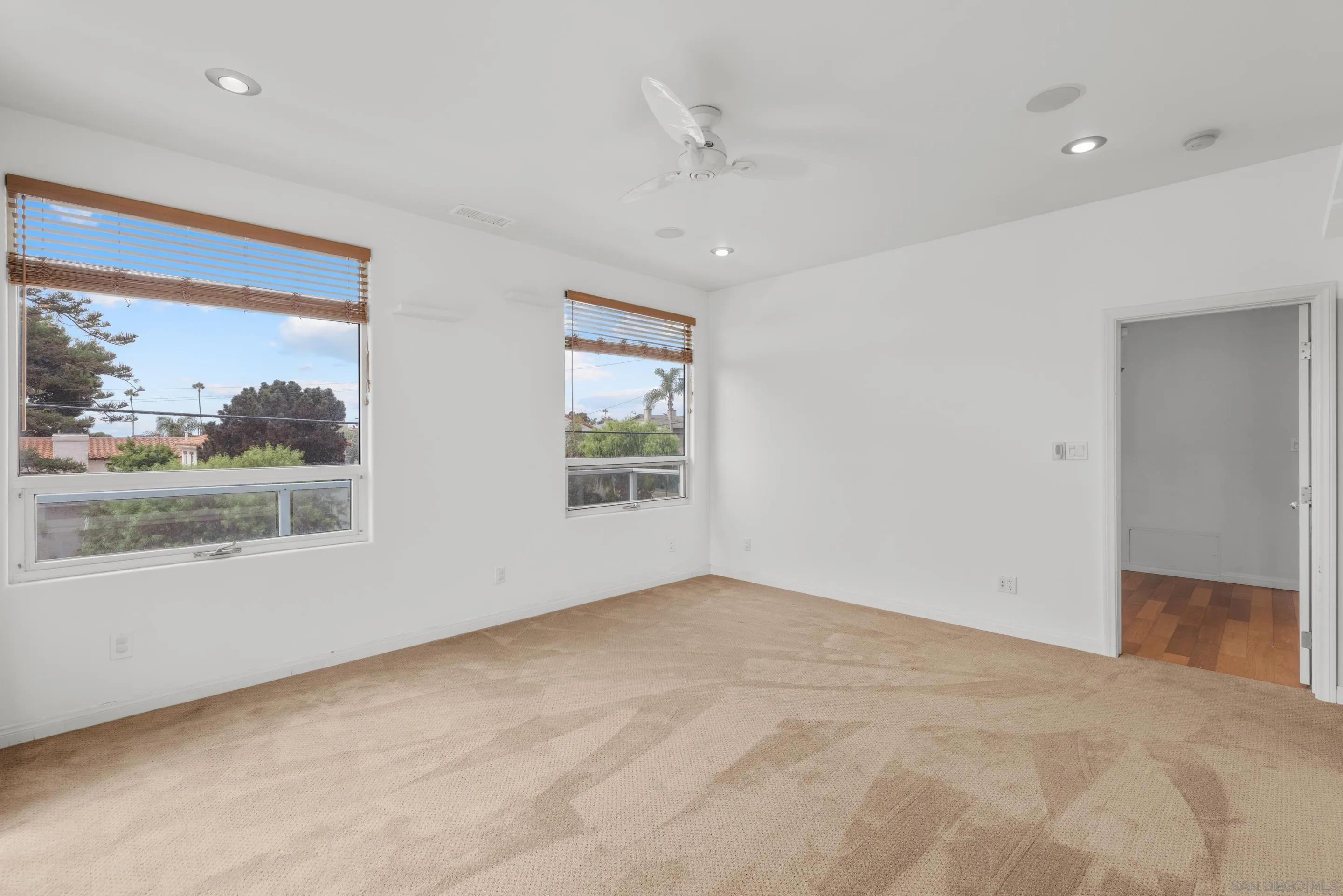 4975 Dawes Street San Diego, CA 92109 - Photo 20 of 39 an empty room with a window