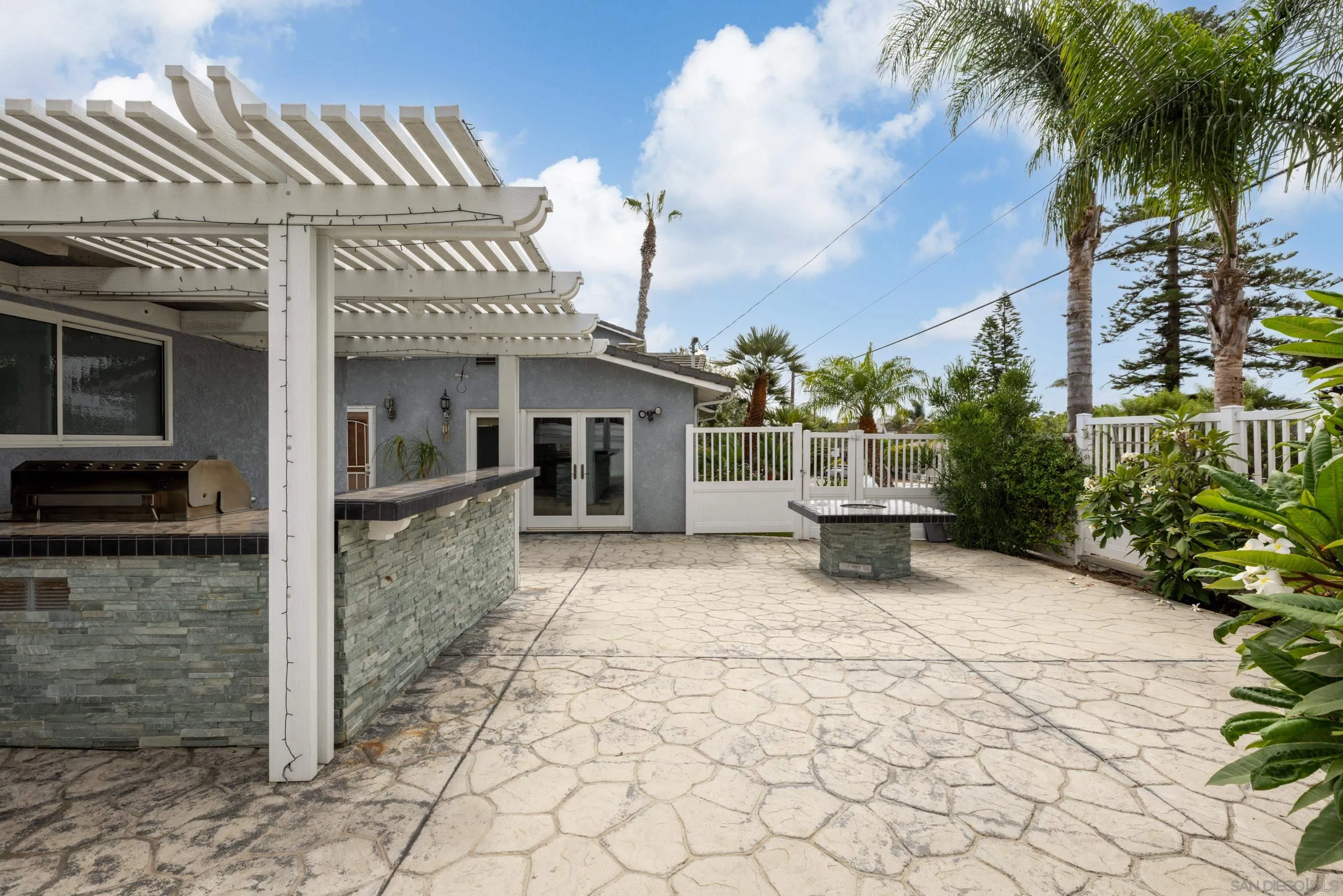 4975 Dawes Street San Diego, CA 92109 - Photo 28 of 39 a view of a house with a patio