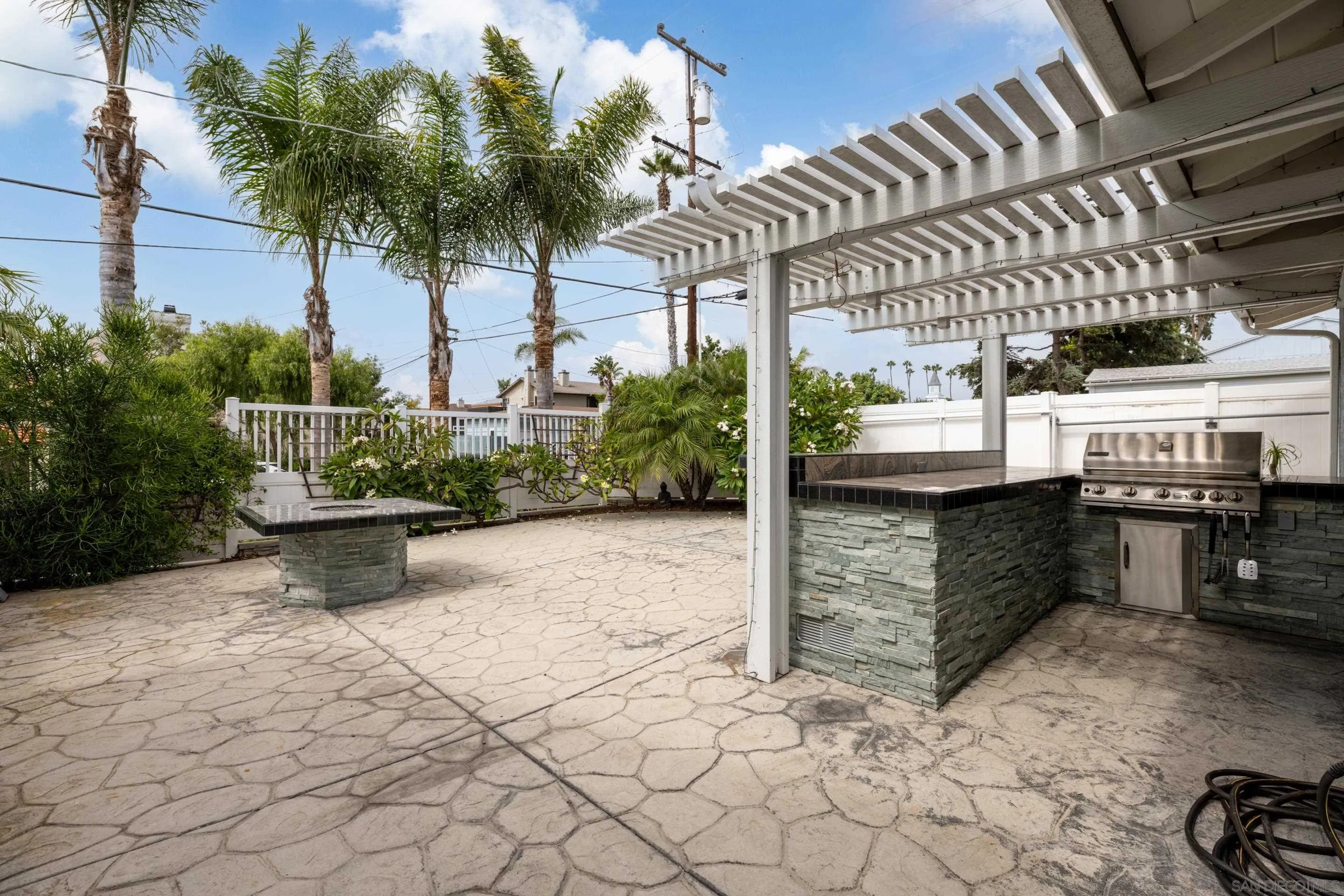 4975 Dawes Street San Diego, CA 92109 - Photo 29 of 39 a view of a porch with plants