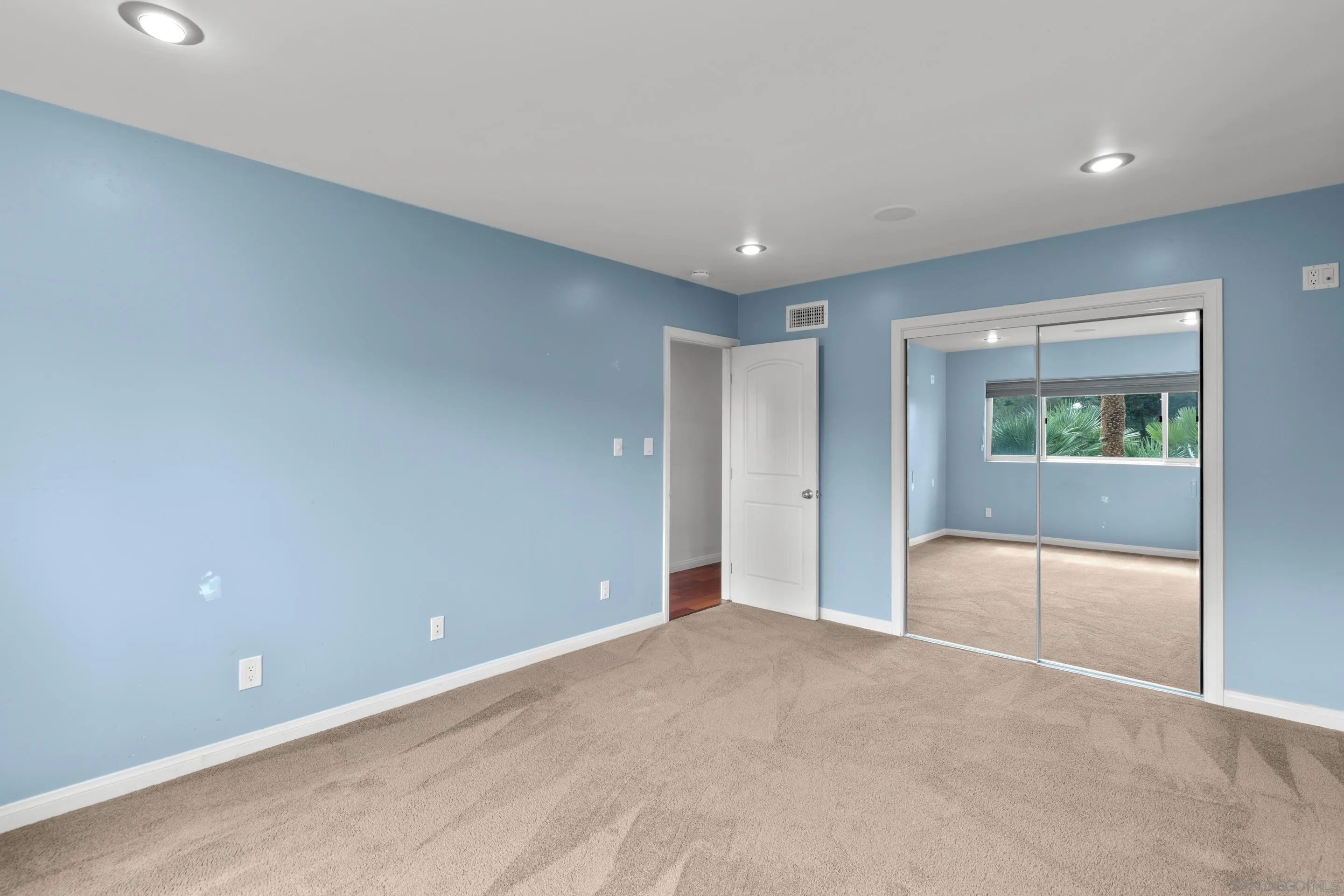 4975 Dawes Street San Diego, CA 92109 - Photo 31 of 39 an empty room with a natural light