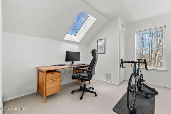 a view of a workspace with gym equipment