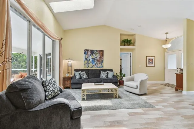 a kitchen with a sink stainless steel appliances and cabinets