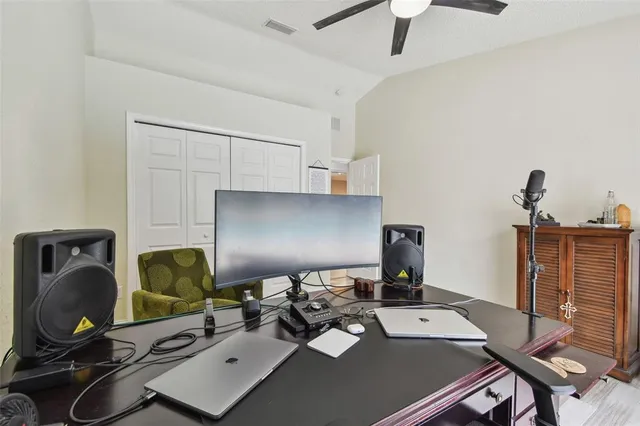 a bathroom with a double vanity sink a large mirror and a shower