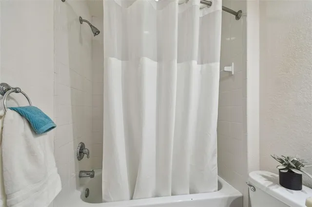 a bathroom with a sink vanity and a mirror