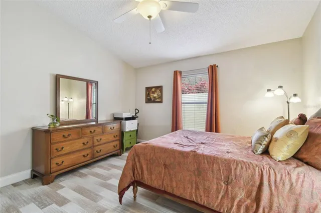 a bathroom with a shower and a mirror