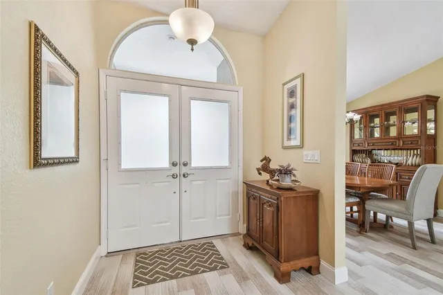 a kitchen with sink cabinets and stainless steel appliances