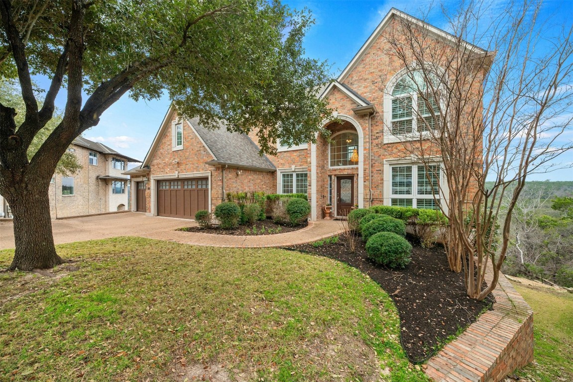 9600 Rainlilly Lane Austin, TX 78759 - Photo 1 of 1 a view of a house with a yard