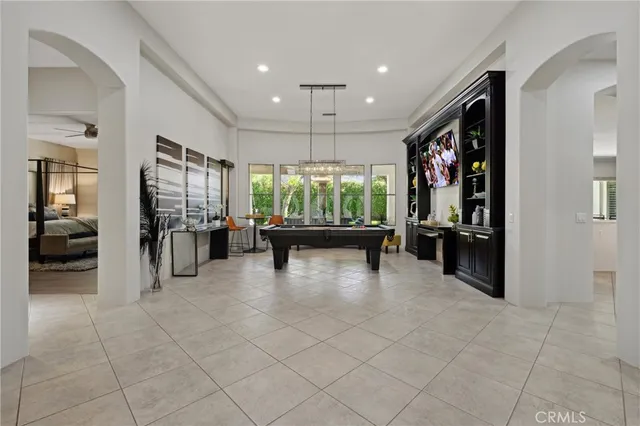 a room with gym equipment and a large window