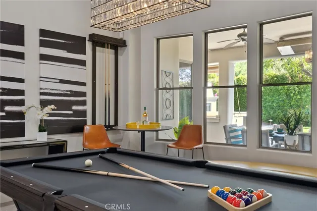 a view of a dining room with furniture window and outside view