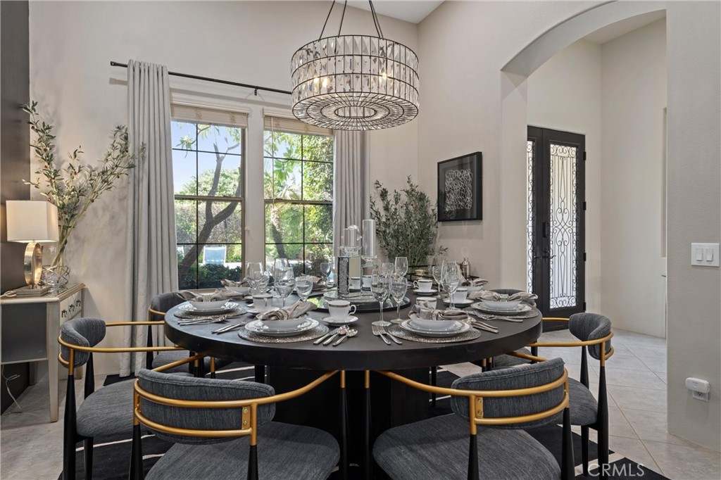 79690 Rancho San Pascual La Quinta, CA 92253 - Photo 16 of 73 a view of a dining room with furniture window and outside view