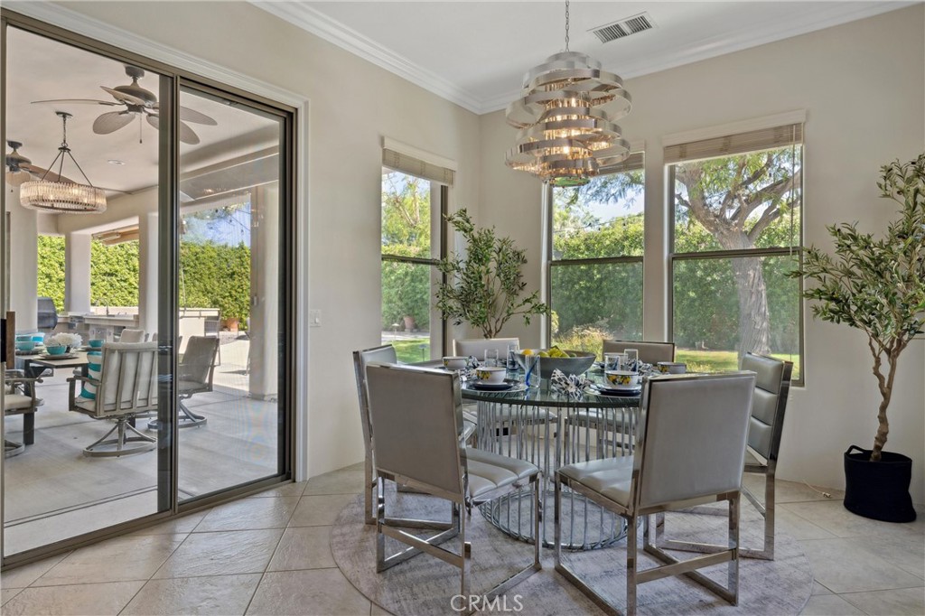 79690 Rancho San Pascual La Quinta, CA 92253 - Photo 24 of 73 a view of a dining room with furniture window and outside view