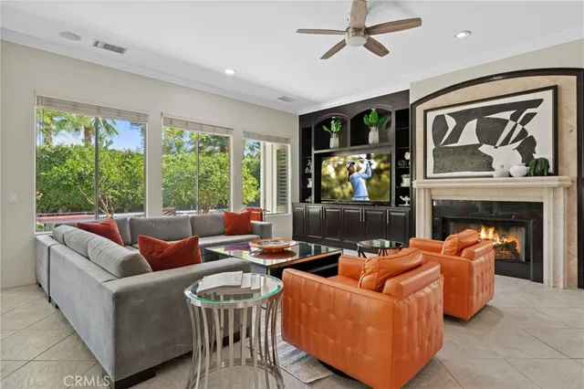 a view of living room with furniture and a rug