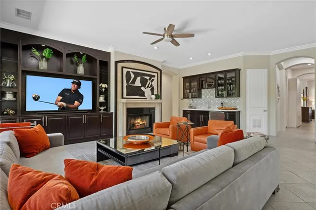 a bedroom with a bed and a lamp