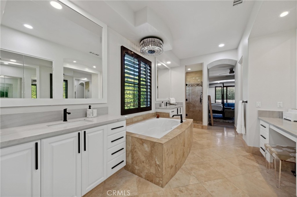 79690 Rancho San Pascual La Quinta, CA 92253 - Photo 32 of 73 Primary spa like bathroom with vanity "glam station"