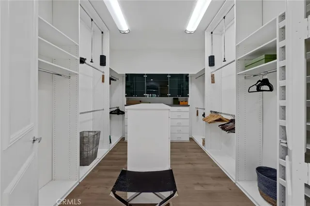 a utility room with sink dryer and washer