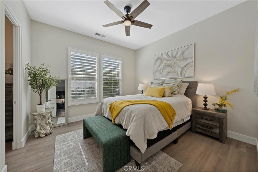 79690 Rancho San Pascual La Quinta, CA 92253 - Photo 37 of 73 a bedroom with a bed and a potted plant