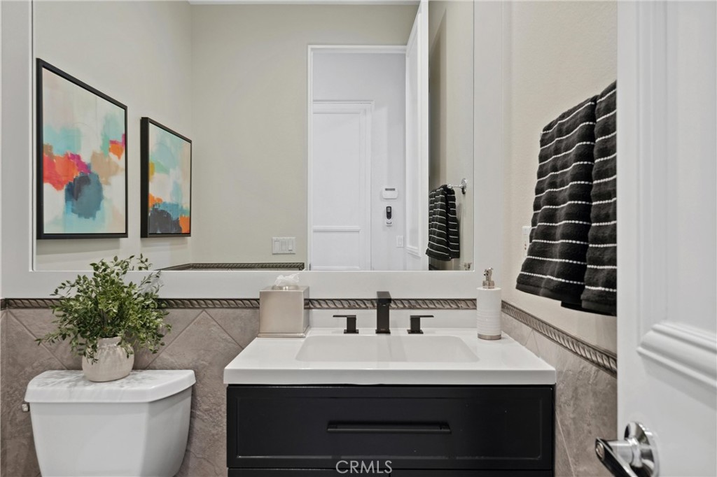 79690 Rancho San Pascual La Quinta, CA 92253 - Photo 43 of 73 a bathroom with a sink toilet and mirror