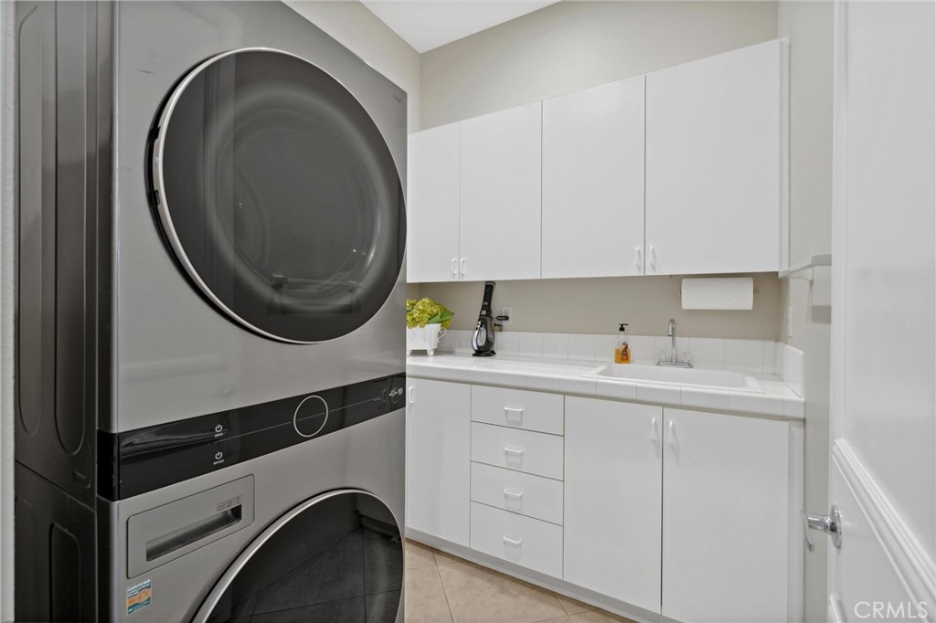 79690 Rancho San Pascual La Quinta, CA 92253 - Photo 44 of 73 a utility room with sink dryer and washer