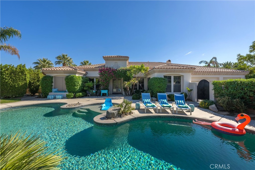 79690 Rancho San Pascual La Quinta, CA 92253 - Photo 6 of 73 a view of a house with backyard sitting area and swimming pool