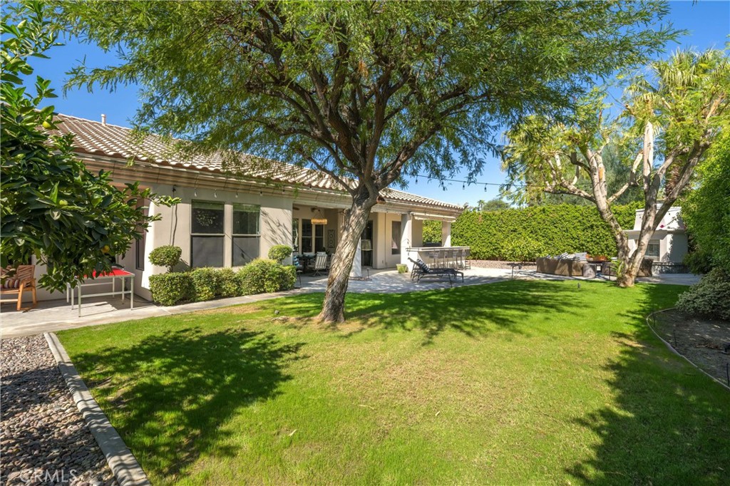 79690 Rancho San Pascual La Quinta, CA 92253 - Photo 66 of 73 a front view of a house with a yard