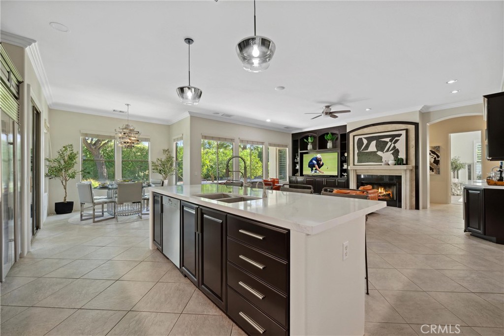 79690 Rancho San Pascual La Quinta, CA 92253 - Photo 10 of 73 a kitchen with stainless steel appliances granite countertop a refrigerator and a stove top oven