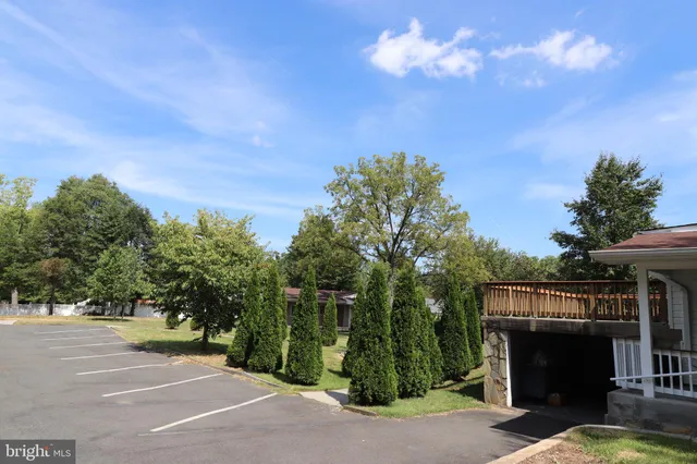 a view of a fire pit and a entertaining space