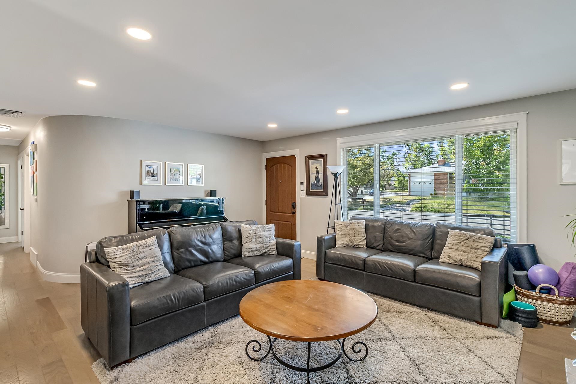 2118 Saguaro Road Grand Junction, CO 81507 - Photo 5 of 42 a living room with furniture and a large window