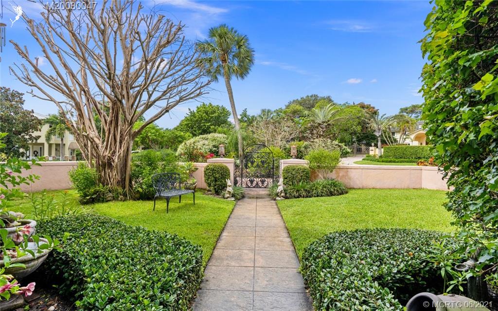 70 North River Road Stuart, FL 34996 - Photo 8 of 56 a view of a garden with an trees