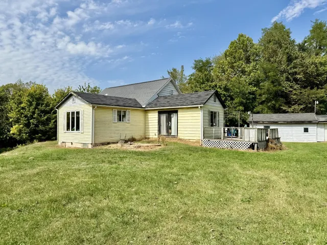 a house view with a garden space